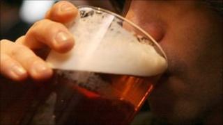 Man drinking a pint