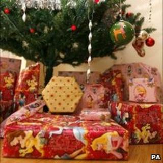 A Christmas tree with presents under it