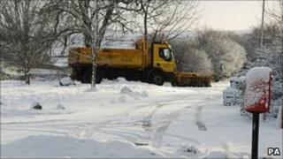 A snow plough clears a road at Slayley, Northumberland