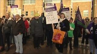 Union members outside the hospital with placards