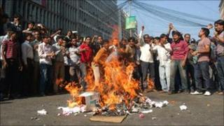 Small investors stage street protests in Dhaka, Bangladesh, on Sunday after the stock market's steepest fall in a single day