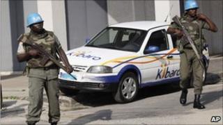 UN peacekeepers patrol street in Abidjan