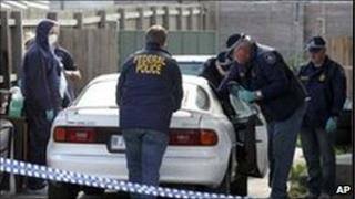 Australian police search car in Melbourne suburb (file image from August 2009)