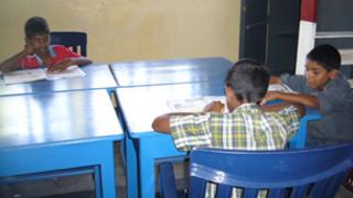 Dhanushka Dilhan (R) and two friends at the Happy Digits orphanage