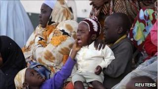 Jos residents in a camp for displaced people, 26/12