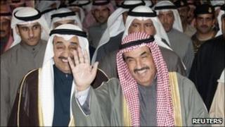 Kuwait"s Prime Minister Sheikh Nasser al-Mohammad al-Sabah waves as he leaves the parliament building in Kuwait December 28, 2010