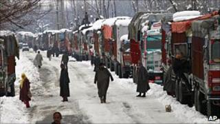 Trucks stranded in the snow in Indian-administered Kashmir