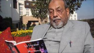 Dr Mobin Akhtar with his book