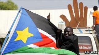 A Sudanese man cheers during a demonstration in support of the referendum in Juba on 7 January 2011