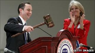 Reince Priebus receiving applause from Republican National Committee Secretary Sharon Day