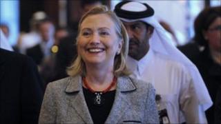 U.S. Secretary of State Hillary Rodham Clinton walks into the Forum for the Future conference in Doha, Qatar, Thursday, Jan.13, 2011.