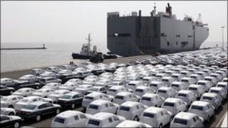 New VW cars wait to get loaded onto transport ships