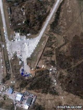 An aerial shot from 12 April shows the Polish jet's wreckage (centre-right) close to Smolensk's Severny airport (image: DigitalGlobe)