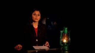 Kantipur TV bulletin presented by kerosene (paraffin) lantern