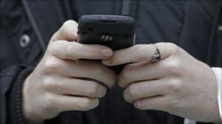 A woman using her mobile phone