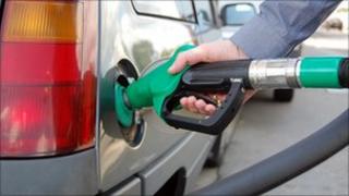 Driver filling up car