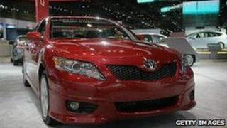 Toyota Camrys are prepared for display at the Chicago Auto Show, 8 February