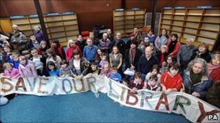 Local residents demonstrate against the potential closure of a library near Milton Keynes