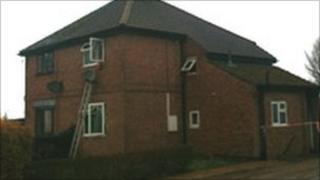 The woman was rescued from a bedroom window