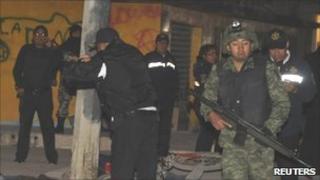 Police investigate the crime scene