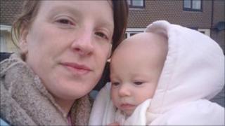Tammy Gillam and her four-month-old daughter Abigail who had to leave their home because of flooding in Llincoln Courts