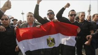 Egyptian policemen stage a protest in Tahrir Square. 14 Feb 2011