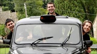 Paul Archer, Johno Ellison and Leigh Purnell in their black cab
