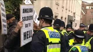 Police with protesters in Luton, March 2009