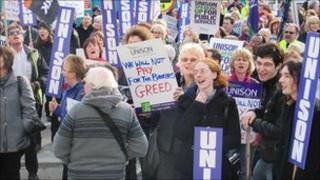 Protestors outside the civic centre with placards