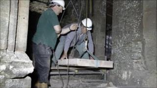 Repairing the grand staircase at Raglan Castle