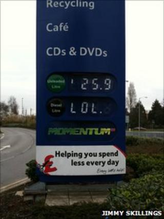Petrol price sign showing unleaded 25.9 pence per litre with the letters LOL underneath