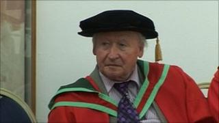 TP Flanagan in gown and cap