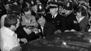 George Davis being helped into a waiting car in May 1976