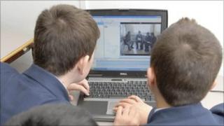 Secondary children on a computer