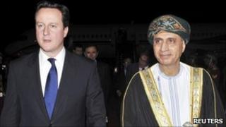British Prime Minister David Cameron (left))with Omani Deputy Prime Minister Fahd bin Mahmoud al-Said