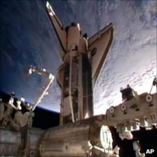 Nasa television video grab of space shuttle Discovery moments after docking at the International Space Station