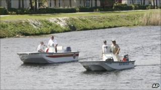 Investigators search the Florida canal