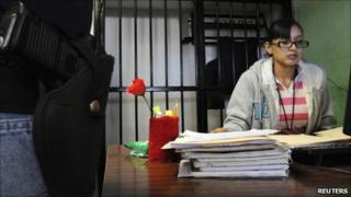 Marisol Valles Garcia talks to a colleague in Praxedis G. Guerrero in this October 29, 2010 file photo.
