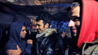 Migrant workers celebrate in Athens (9 March 2011)