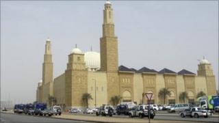 Saudi policemen form a check point outside Al Rajhi mosque, where a demonstration expected to take place in Riyadh, Saudi Arabia, Friday, March 11, 2011.