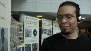 Professor George Watley from the university using the audio guide