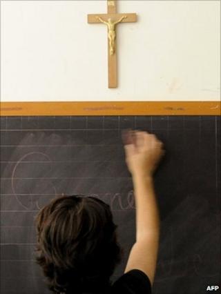 A crucifix hangs in a classroom in Italy (photo taken on July 1, 2010)