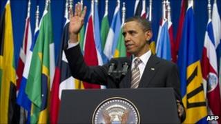 US President Barack Obama waving after speaking in Santiago