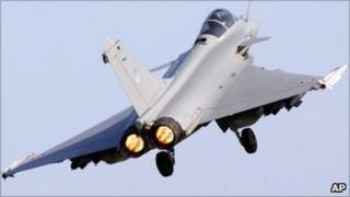 A French Air Force Rafale jet fighter takes off for a mission to Libya from Solenzara Air Base, on Corsica - 26 March 2011