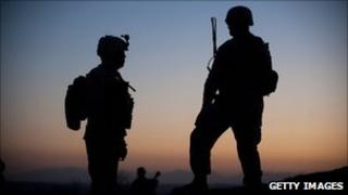Silhouette of two US Marines, Helmand province, January 2011