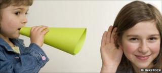 Girl speaking to teenager