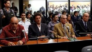 Raul Guglielminetti, Honorio Ruiz, Eduardo Ruffo and Eduardo Cabanillas sit in court before their sentencing in Buenos Aires