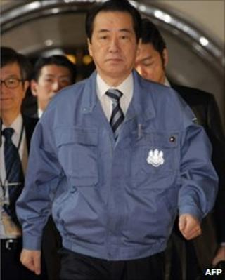 Prime Minister Naoto Kan arrives at parliament on 30 March 2011