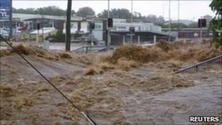 A street is covered by a flash flood in Toowoomba, Queensland