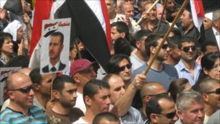 Protesters in support of Syrian President Assad